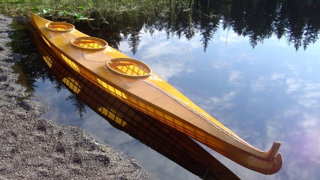 Three person canoe in the water